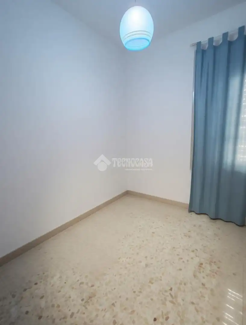 Dormitori de Casa adosada en venda en Marchena amb Aire condicionat