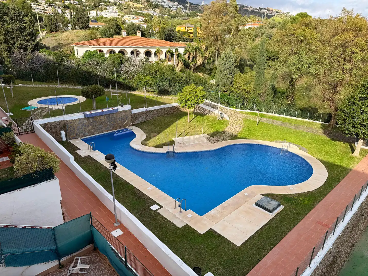 Swimming pool of Flat for sale in Benalmádena  with Air Conditioner, Storage room and Oven