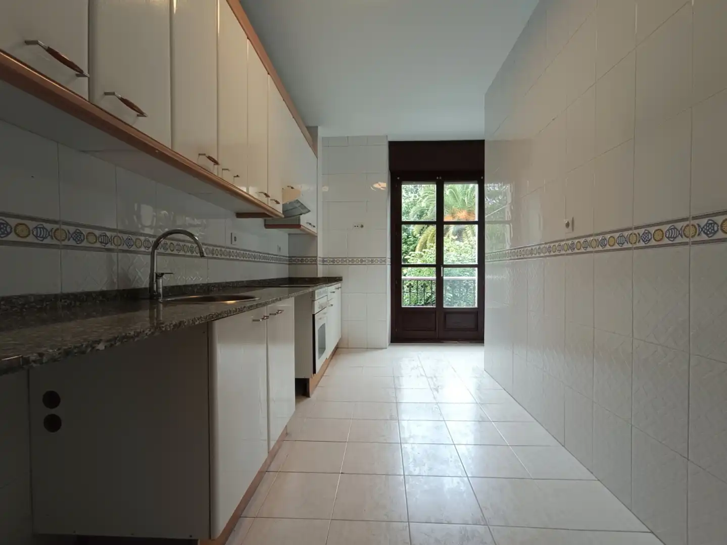 Kitchen of Flat for rent in Gijón   with Heating, Terrace and Balcony