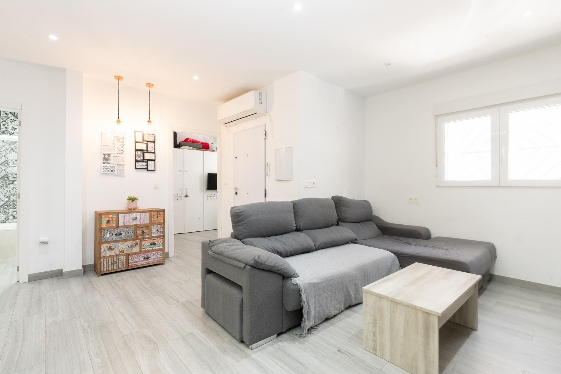 Sala d'estar de Casa o xalet en venda en Motril amb Aire condicionat i Terrassa