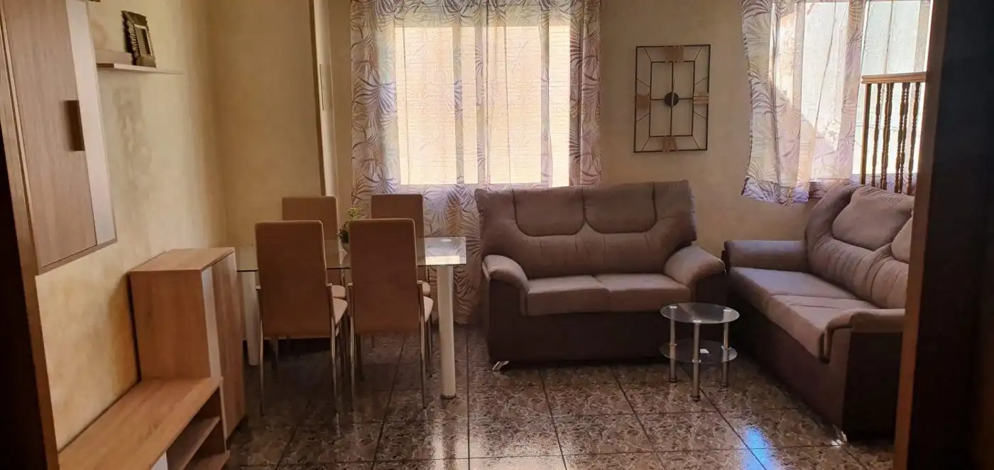 Sala d'estar de Casa adosada en venda en Orihuela amb Terrassa i Moblat