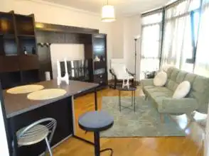 Sala de estar de Dúplex de alquiler en Gijón  con Calefacción, Parquet y Amueblado