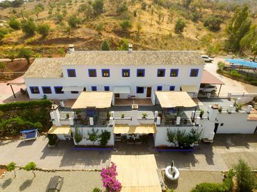 Casa rústica amb piscina en venda a Guaro