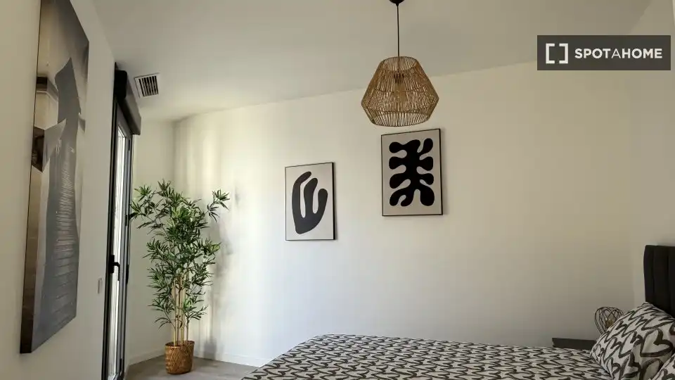 Dormitori de Apartament per a compartir en Málaga amb Aire condicionat, Terrassa i Moblat