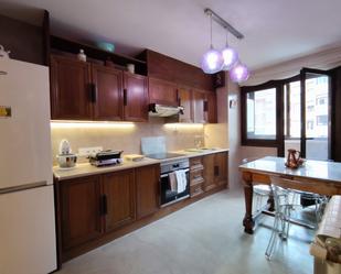 Kitchen of Flat for sale in Oviedo   with Heating, Parquet flooring and Storage room