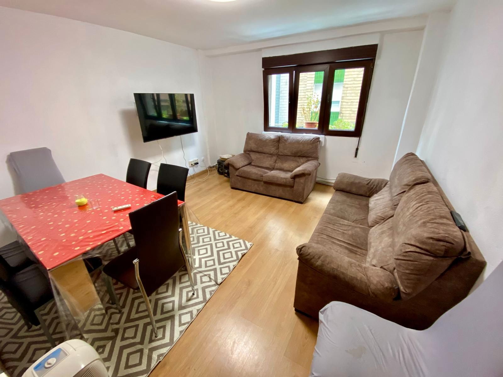 Living room of Flat for sale in Gijón   with Parquet flooring, Oven and Washing machine
