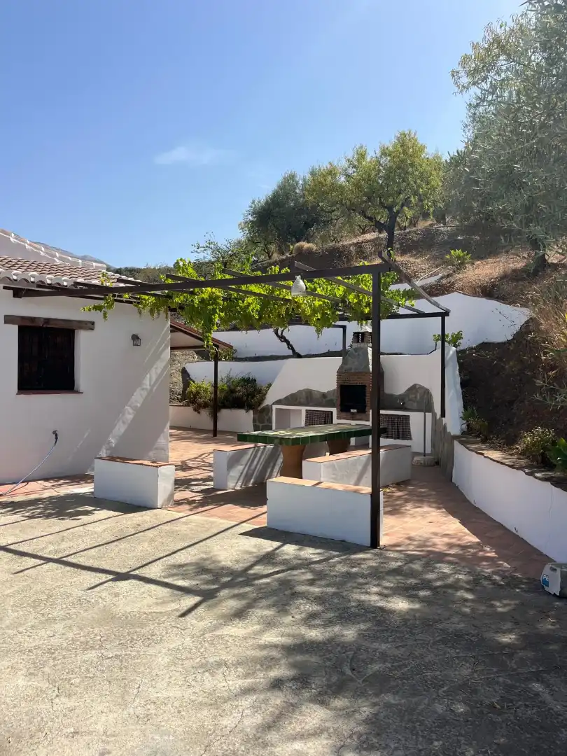 Terrassa de Finca rústica de lloguer en Sedella amb Aire condicionat, Jardí privat i Traster