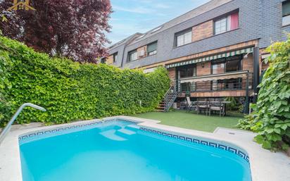 Swimming pool of Single-family semi-detached for sale in Las Rozas de Madrid