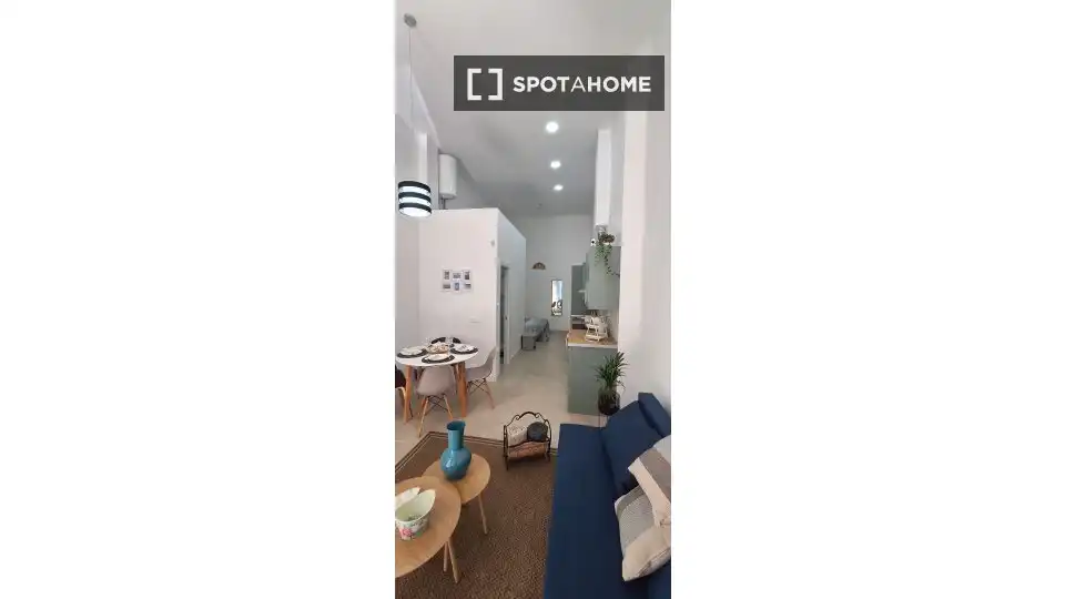 Sala d'estar de Apartament per a compartir en Carretera de Cádiz