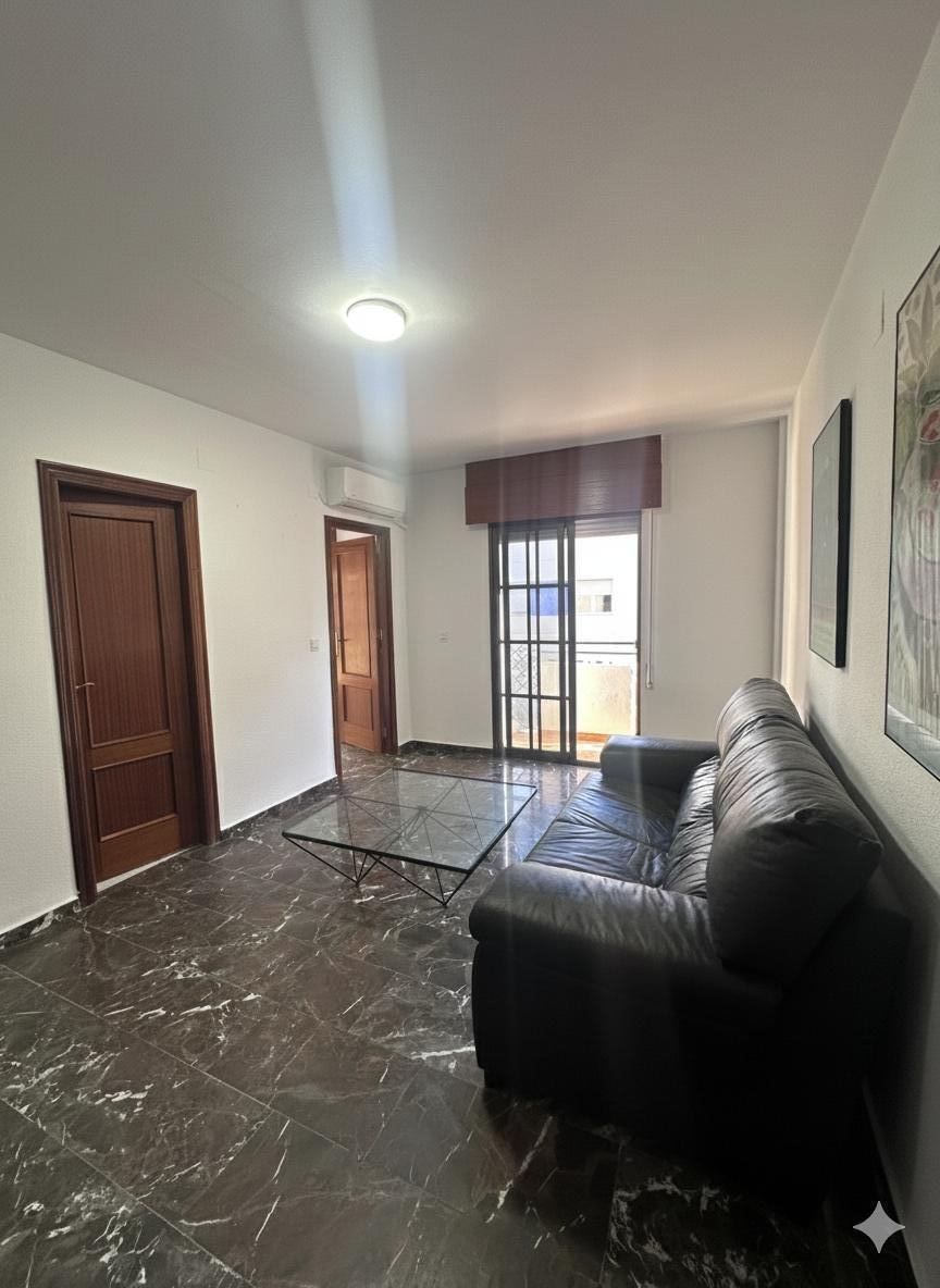 Sala d'estar de Pis de lloguer en Motril amb Aire condicionat i Balcó