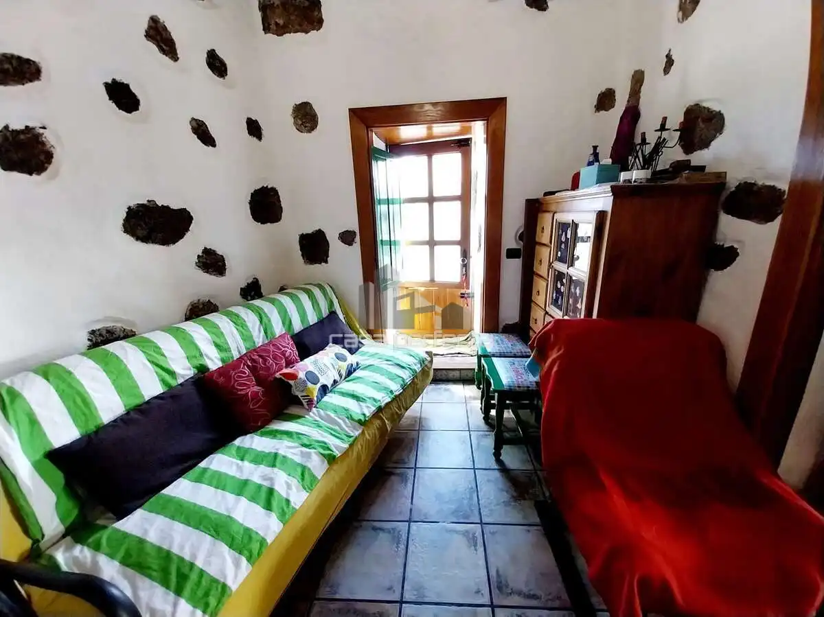 Sala de estar de Finca rústica en venta en Tías con Terraza, Amueblado y Microondas