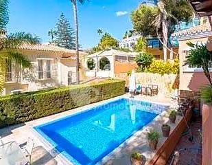 Exterior view of House or chalet for sale in Málaga Capital  with Air Conditioner, Terrace and Swimming Pool