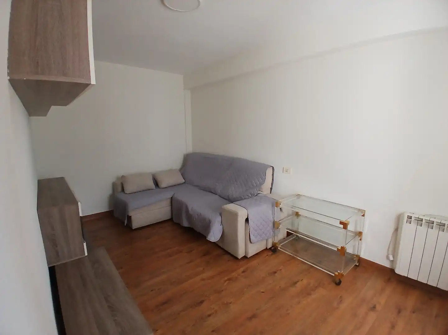 Sala de estar de Piso de alquiler en Gijón  con Calefacción, Parquet y Amueblado