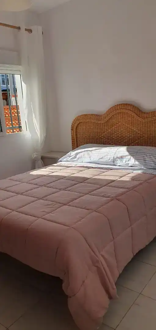 Dormitori de Casa adosada de lloguer en Mazagón amb Jardí privat, Moblat i Forn