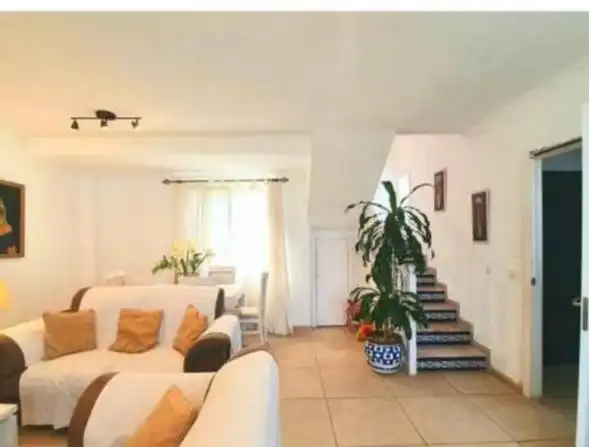 Sala de estar de Casa adosada en venta en Algeciras con Jardín privado, Terraza y Amueblado