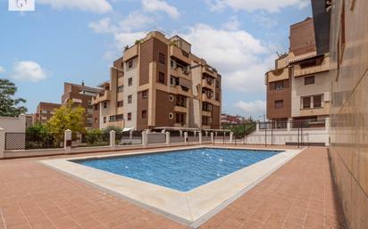 Swimming pool of Attic for sale in  Granada Capital  with Air Conditioner, Terrace and Balcony