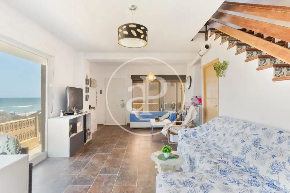 Sala d'estar de Casa adosada en venda en Sueca amb Calefacció, Terrassa i Traster