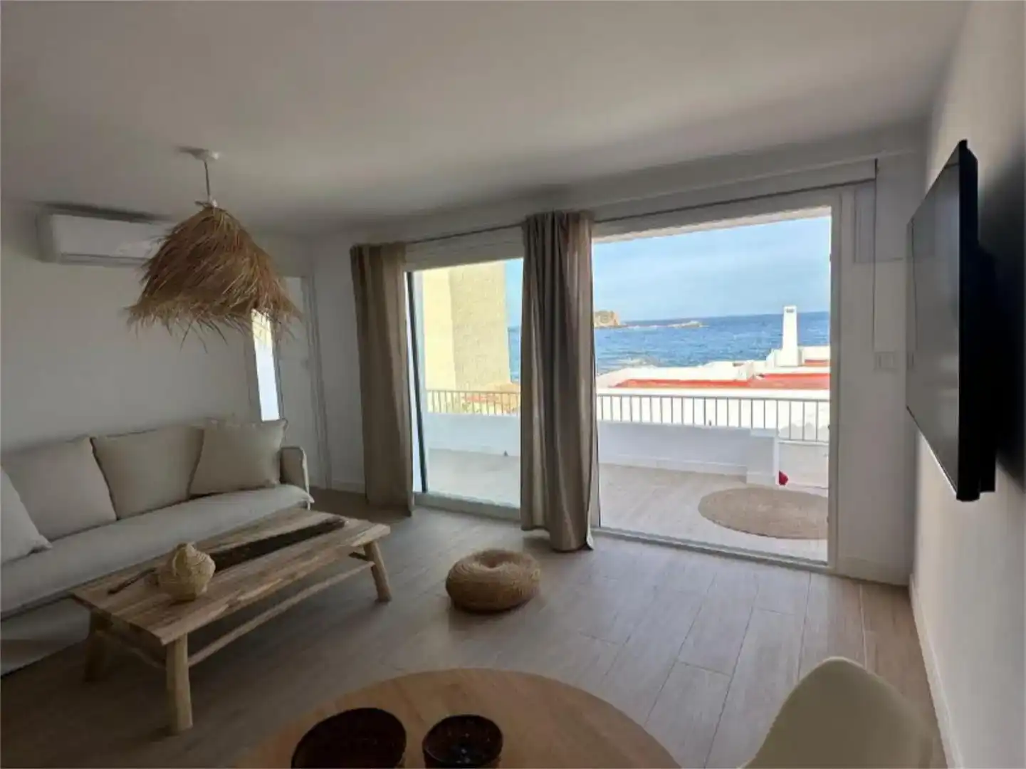 Sala d'estar de Pis de lloguer en Santa Eulària des Riu amb Aire condicionat, Parquet i Moblat