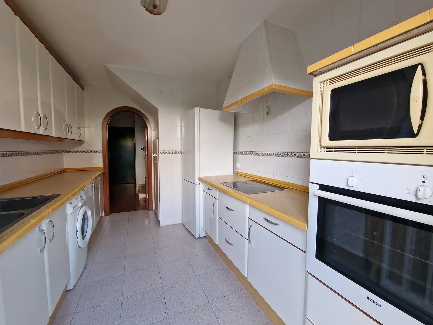 Cocina de Casa adosada en venta en Umbrete con Aire acondicionado, Calefacción y Jardín privado