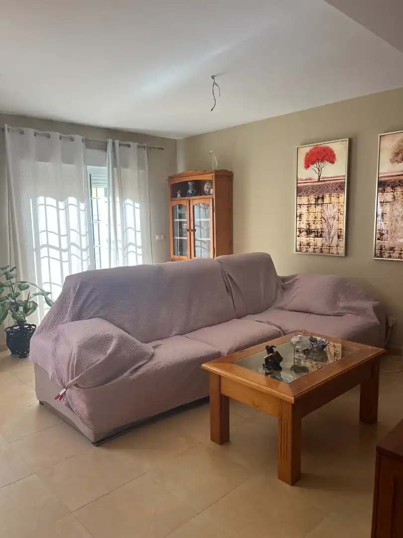 Sala d'estar de Casa adosada en venda en Alhaurín de la Torre amb Aire condicionat, Traster i Piscina comunitària