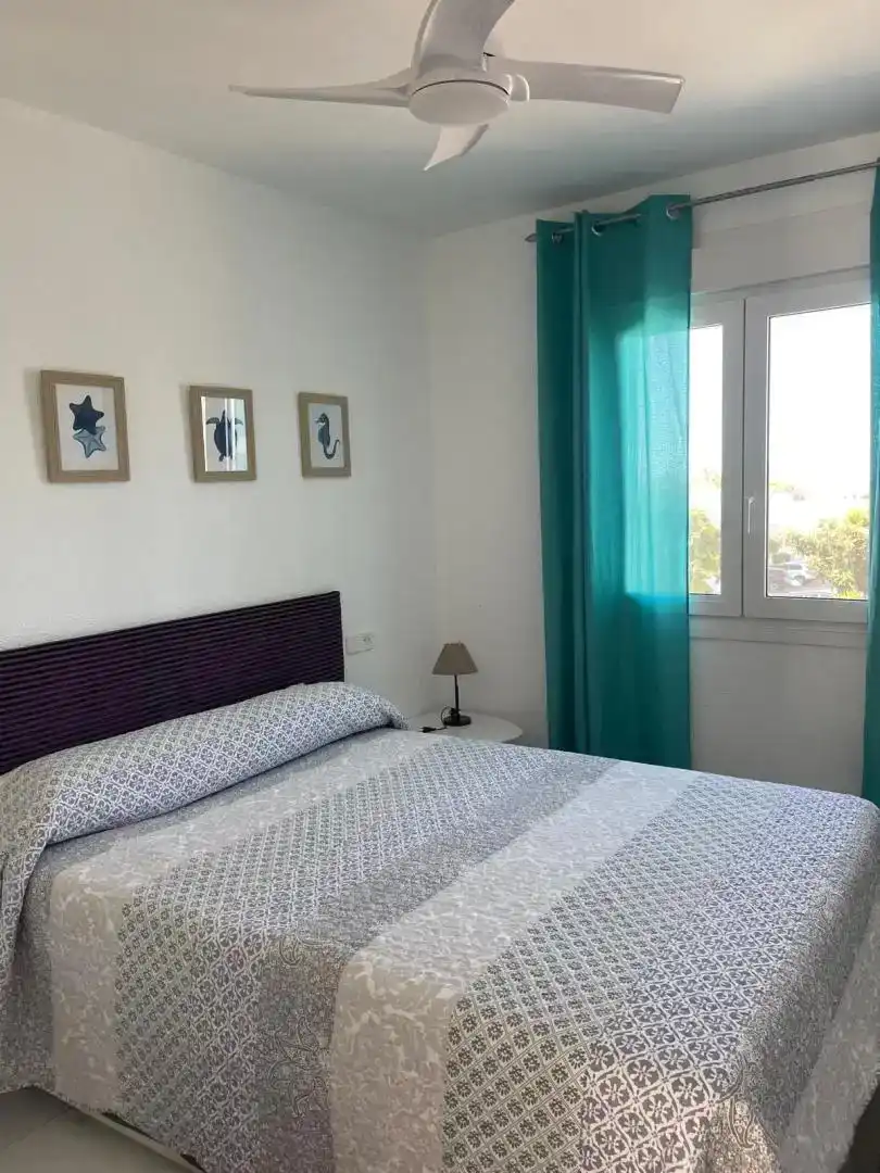 Schlafzimmer von Maisonette zur Miete in El Rompido mit Schwimmbad und Balkon