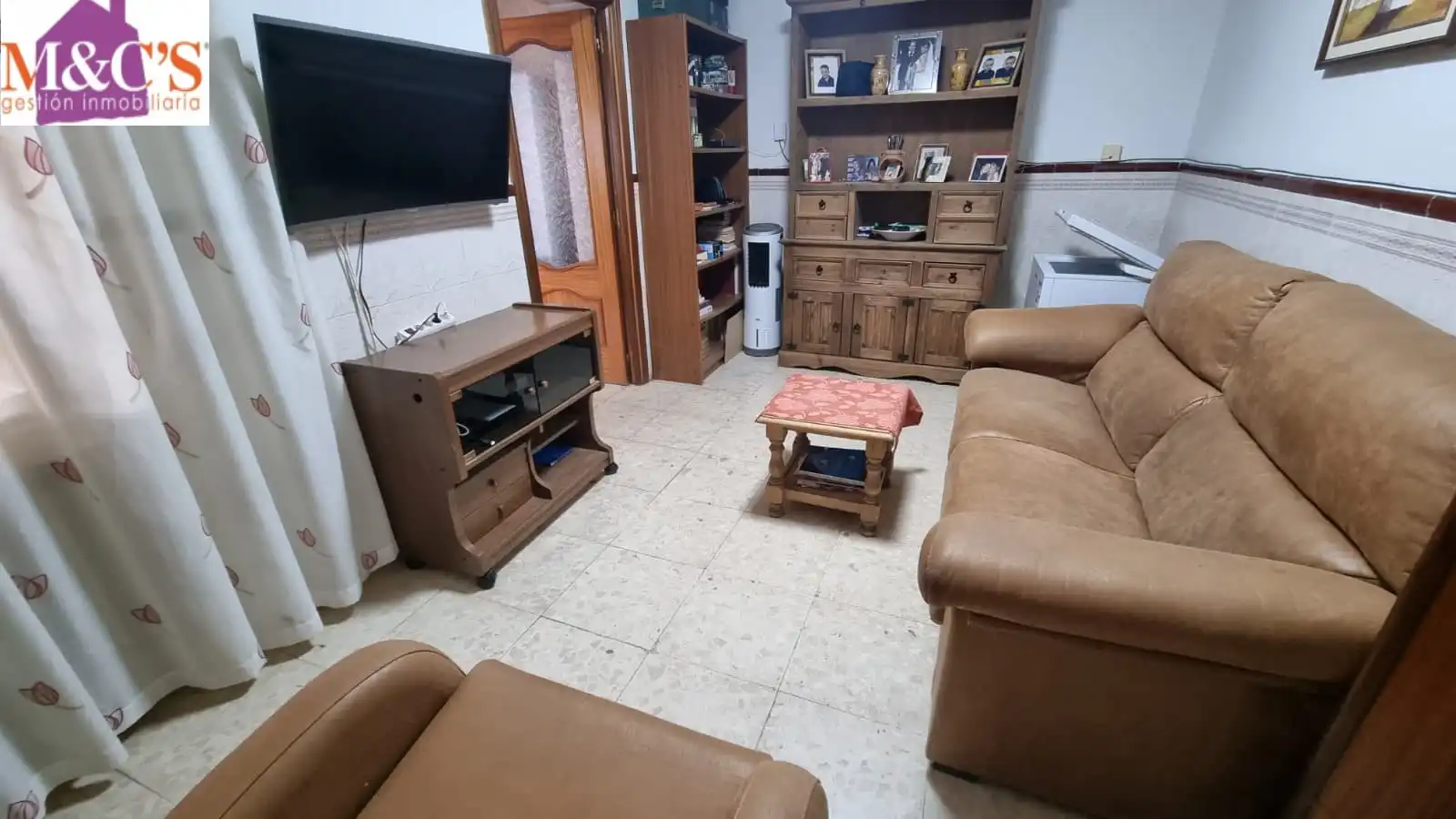 Sala d'estar de Casa o xalet en venda en Puertollano amb Aire condicionat, Terrassa i Traster
