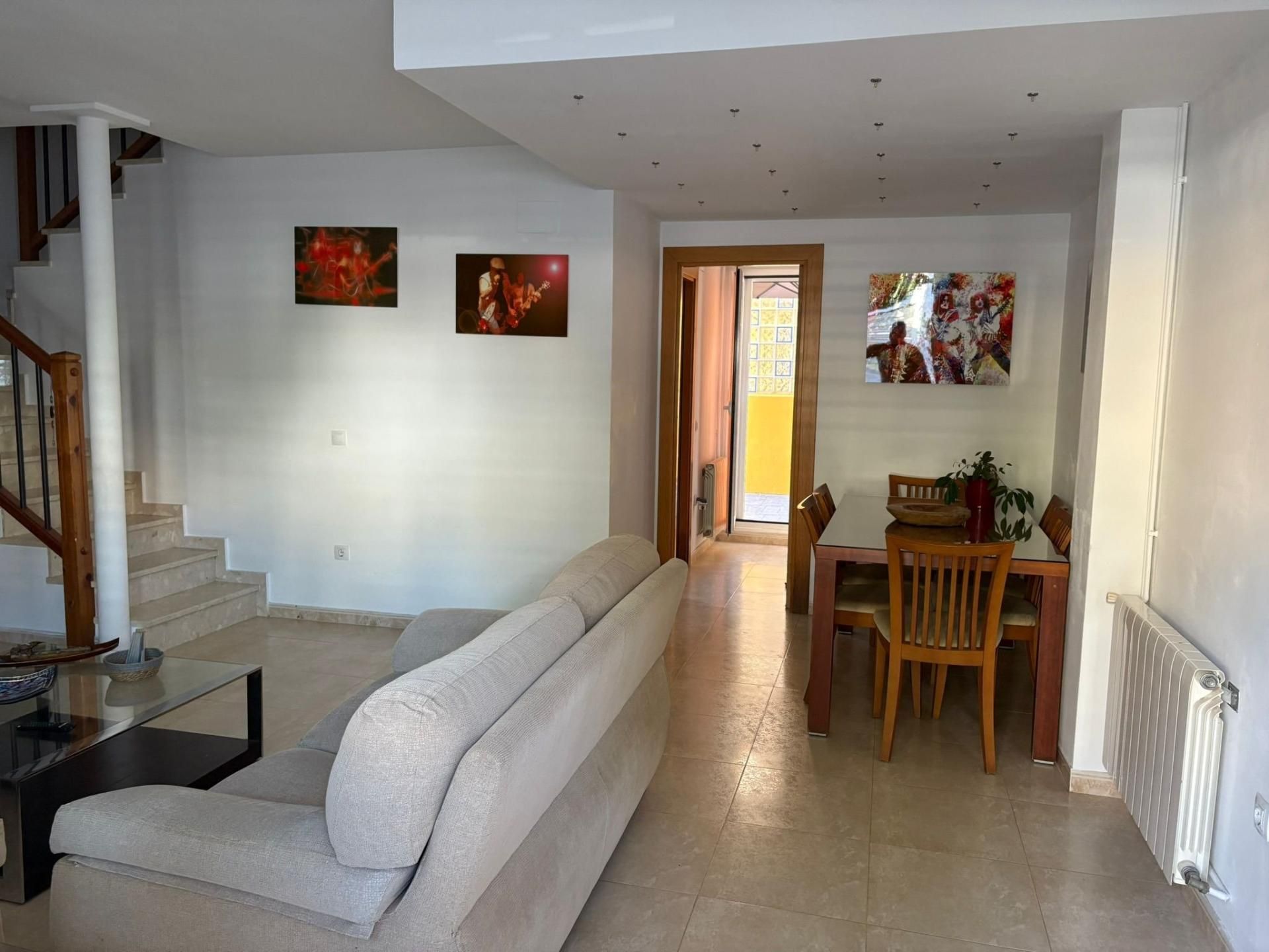 Sala d'estar de Casa adosada en venda en Cullera amb Aire condicionat, Calefacció i Terrassa