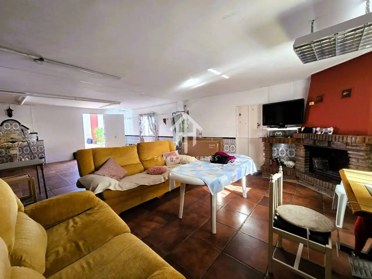 Sala d'estar de Casa o xalet en venda en Loja amb Jardí privat, Terrassa i Piscina