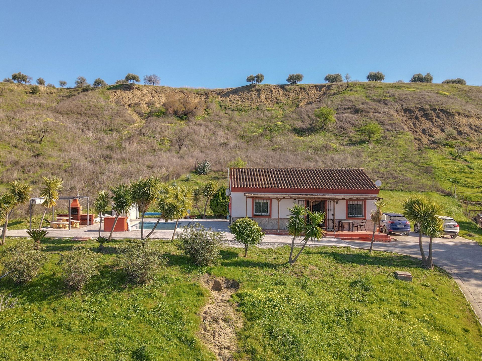 Vista exterior de Casa o xalet en venda en Coín amb Aire condicionat, Jardí privat i Piscina