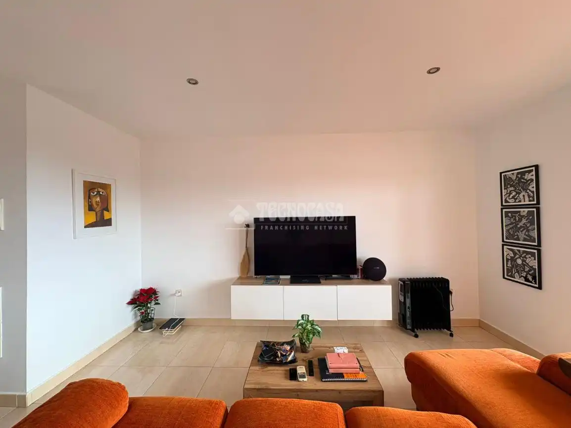 Sala de estar de Piso en venta en Manilva con Aire acondicionado, Terraza y Piscina comunitaria