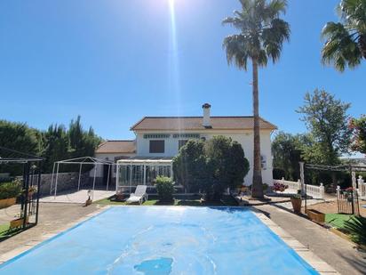 Exterior view of House or chalet for sale in La Carlota  with Terrace and Swimming Pool