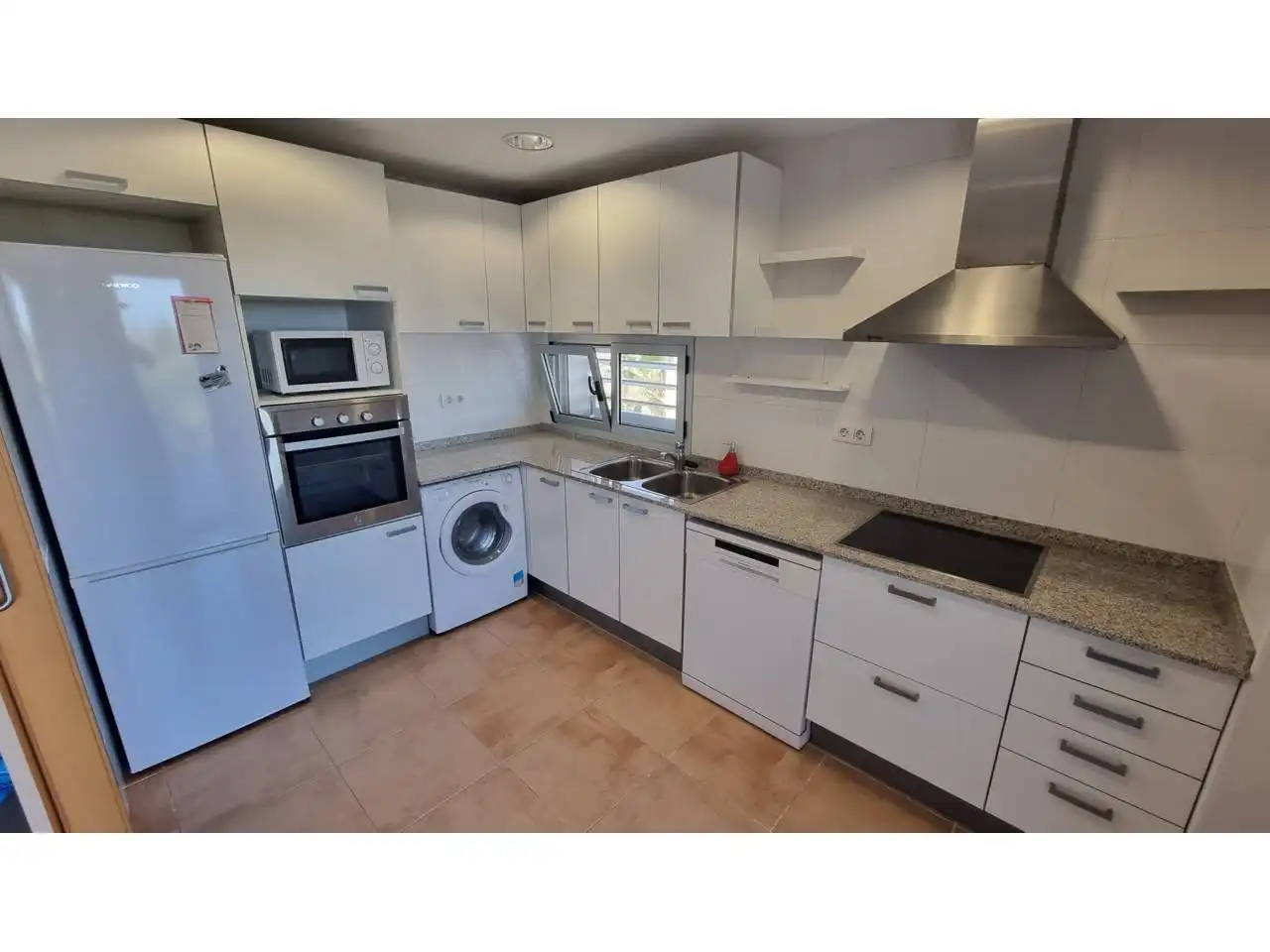Kitchen of Flat for sale in L'Ampolla  with Air Conditioner, Heating and Balcony