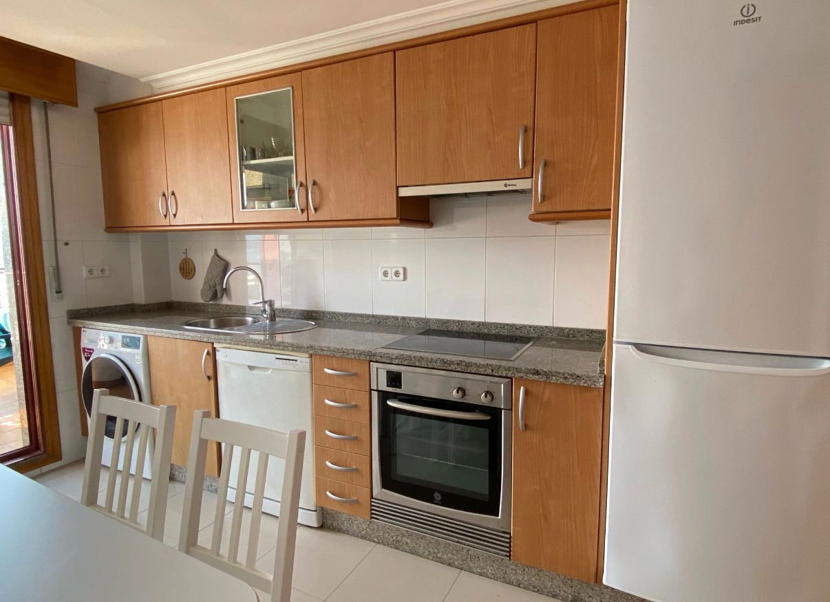 Kitchen of Attic to rent in Sanxenxo  with Heating, Parquet flooring and Terrace