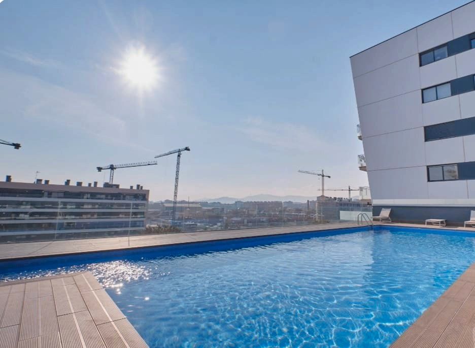 Swimming pool of Flat for sale in Badalona  with Air Conditioner, Heating and Parquet flooring