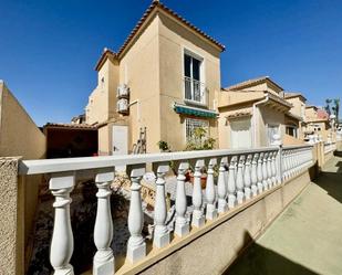 Exterior view of Single-family semi-detached for sale in Torrevieja  with Air Conditioner, Private garden and Terrace