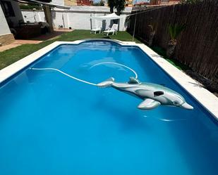 Piscina de Casa o xalet de lloguer en Bollullos de la Mitación amb Aire condicionat i Piscina