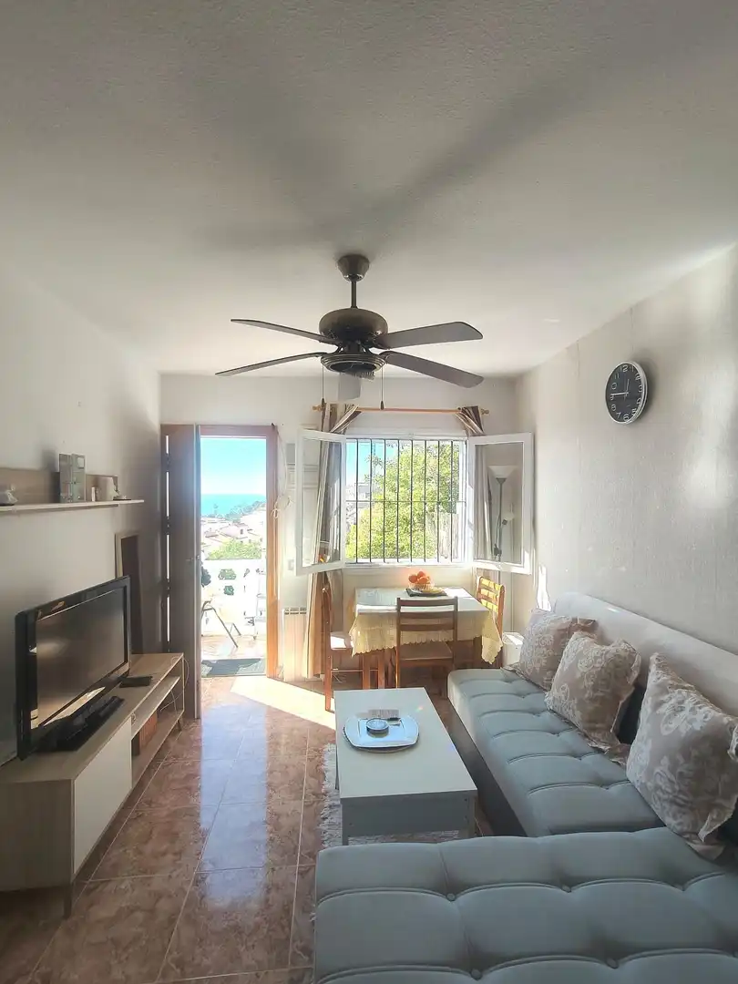 Sala d'estar de Casa adosada en venda en Santa Pola amb Aire condicionat, Calefacció i Jardí privat