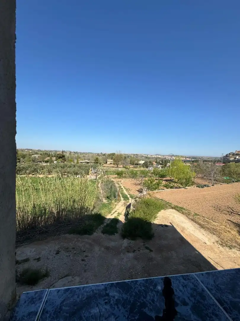 Casa adosada en venda en Alcañiz amb Terrassa, Traster i Piscina comunitària