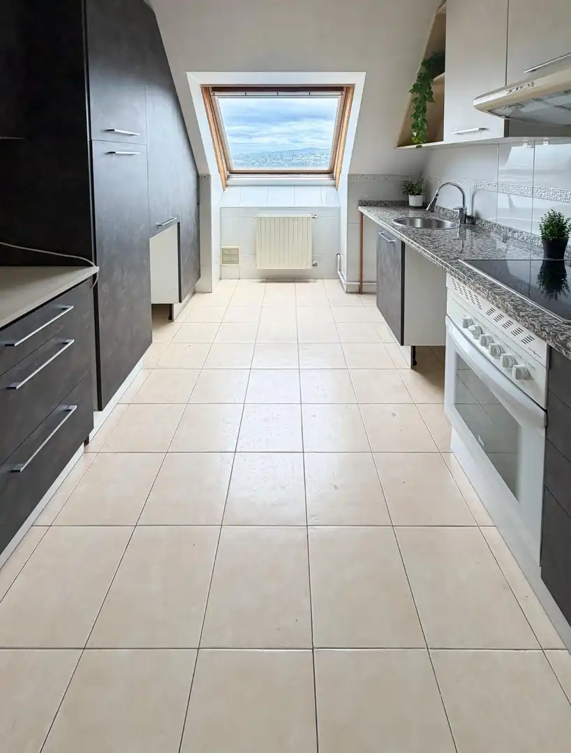 Kitchen of Attic for sale in Oviedo   with Heating, Parquet flooring and Storage room