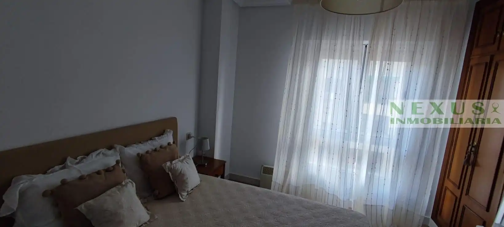 Schlafzimmer von Dachboden zur Miete in Cáceres mit Klimaanlage, Heizung und Möbliert