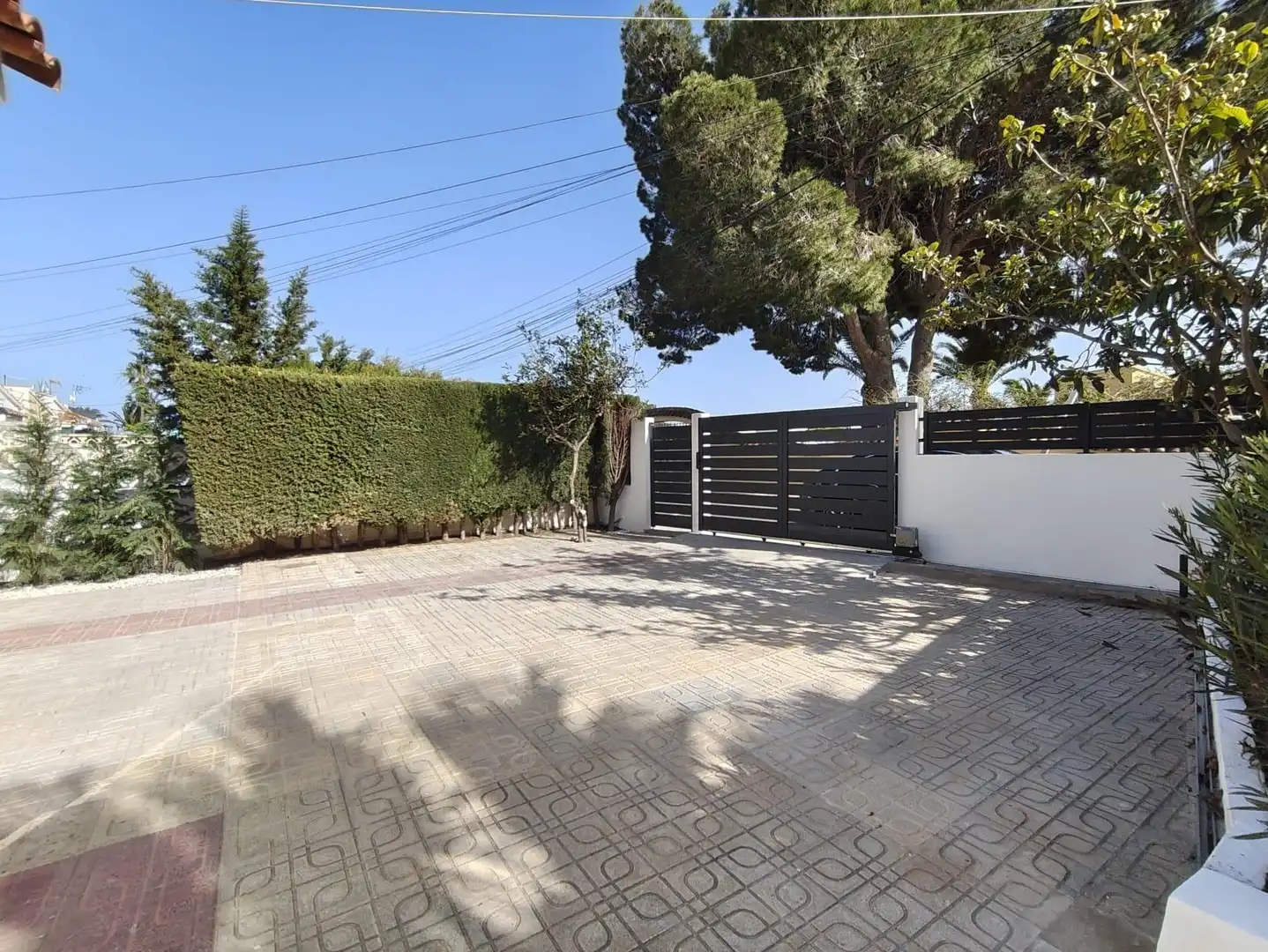 Vista exterior de Casa adosada en venta en La Nucia con Aire acondicionado, Calefacción y Jardín privado