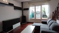 Sala d'estar de Casa adosada en venda en Polanco amb Terrassa