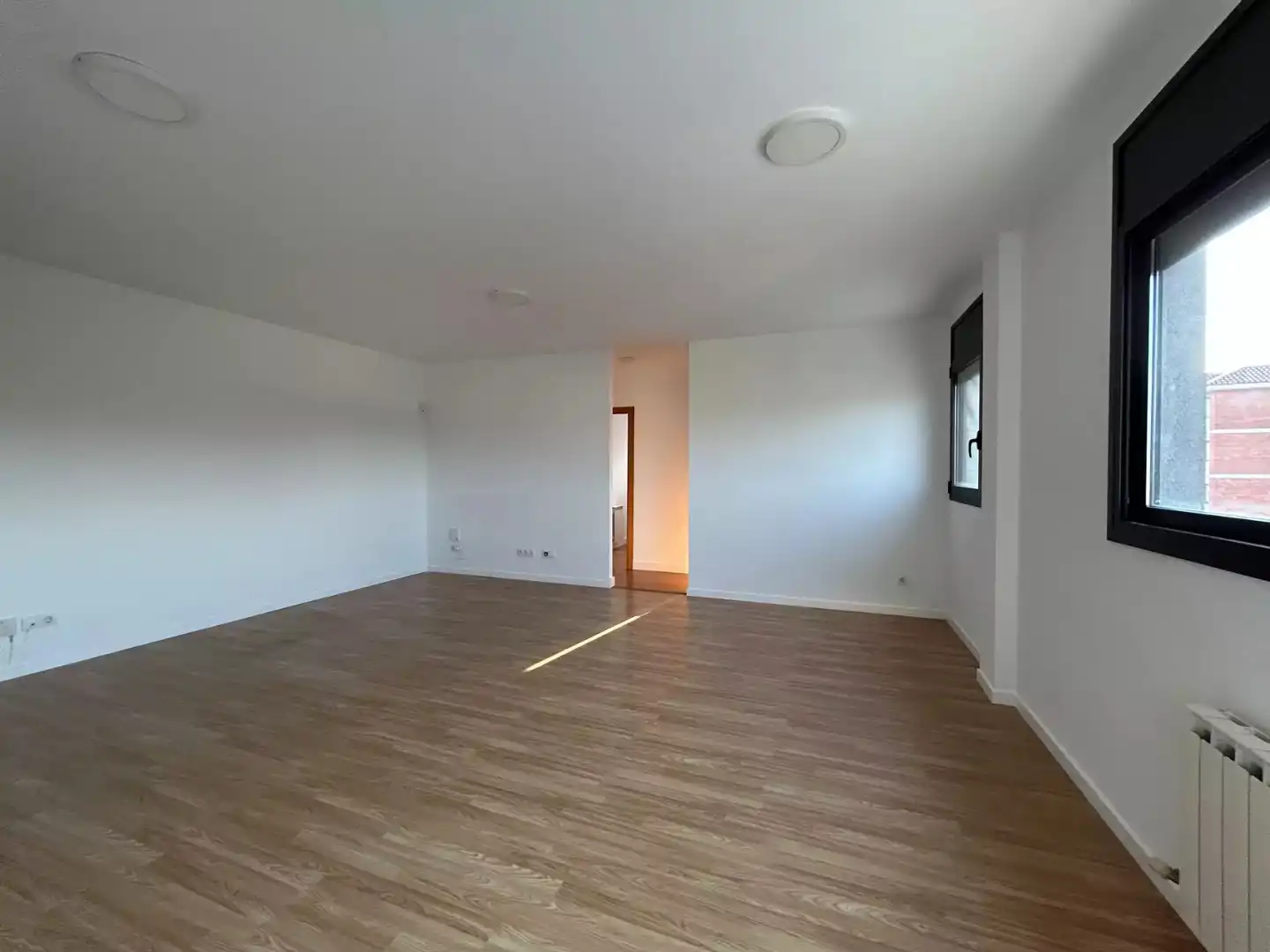 Living room of Flat for sale in Hostalric  with Parquet flooring, Terrace and Storage room