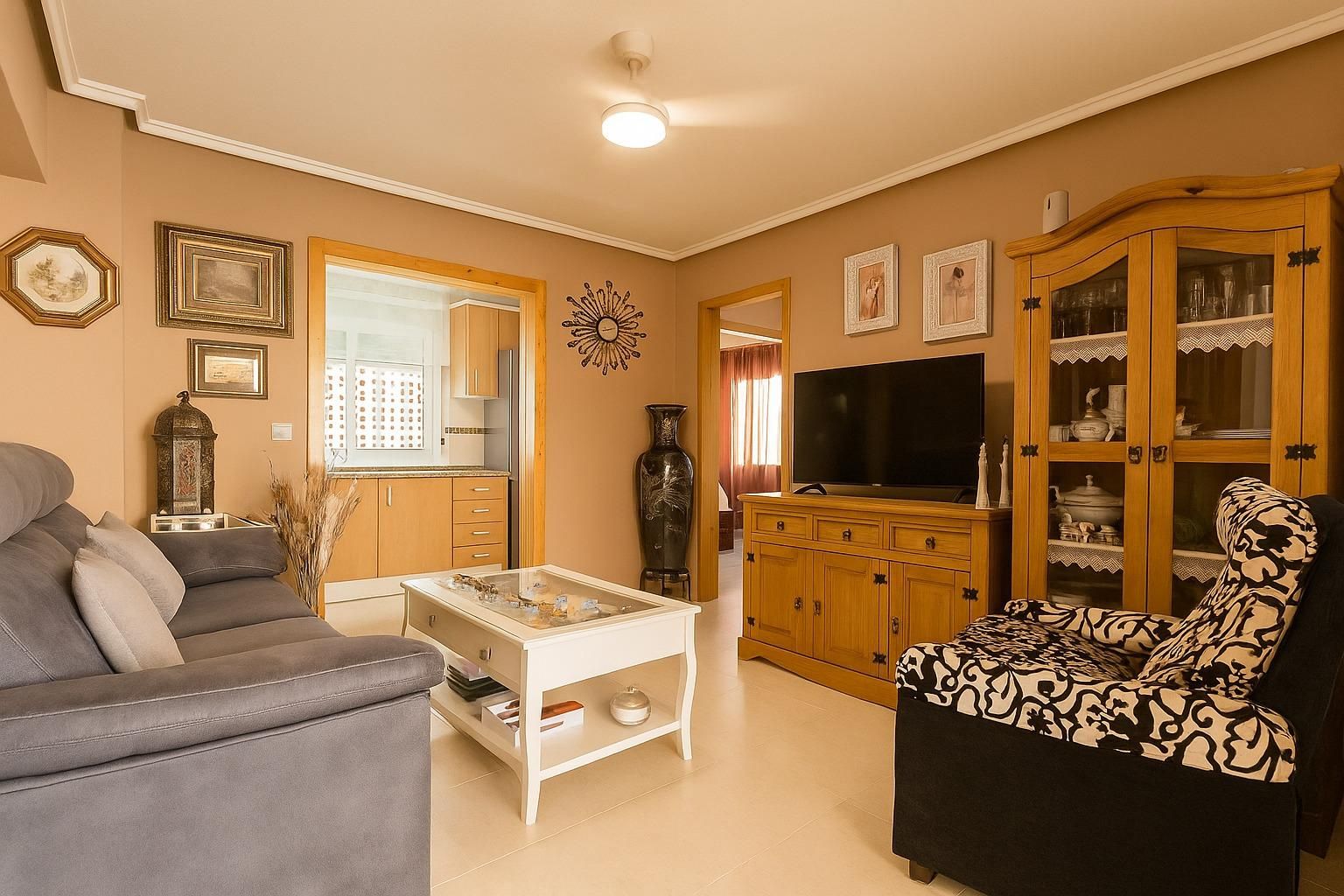 Sala d'estar de Pis en venda en Santa Pola amb Calefacció, Jardí privat i Terrassa