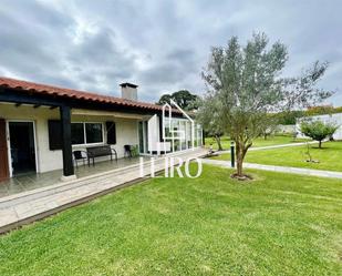 Exterior view of House or chalet for sale in Ribadumia  with Swimming Pool