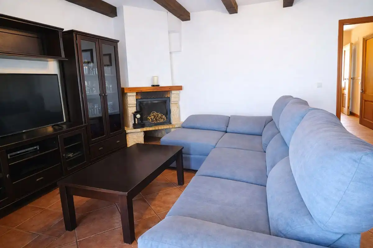 Sala d'estar de Casa adosada en venda en San Roque amb Aire condicionat, Jardí privat i Terrassa