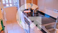 Kitchen of Flat for sale in Vilanova i la Geltrú  with Air Conditioner, Oven and Balcony