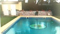 Swimming pool of House or chalet for sale in Sanlúcar la Mayor  with Air Conditioner, Terrace and Storage room