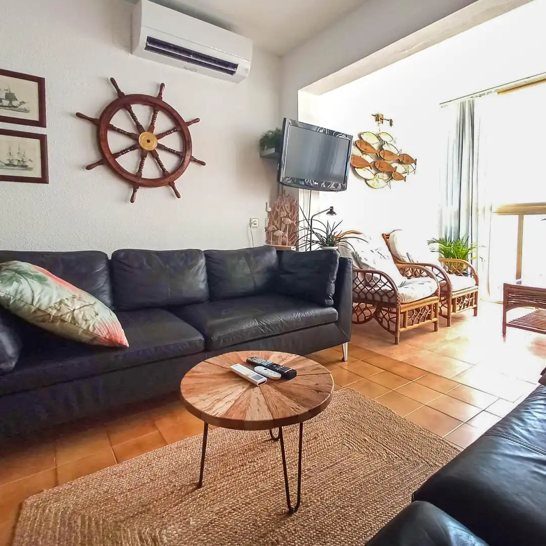 Sala de estar de Apartamento de alquiler en L'Alfàs del Pi con Aire acondicionado, Jardín privado y Terraza