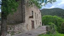 Vista exterior de Finca rústica en venda en Sant Joan Les Fonts amb Aire condicionat, Calefacció i Jardí privat